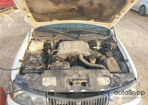 1999 Lincoln Town Car Signature z USA, uszkodzony, nr VIN 1LNHM82W9XY655949